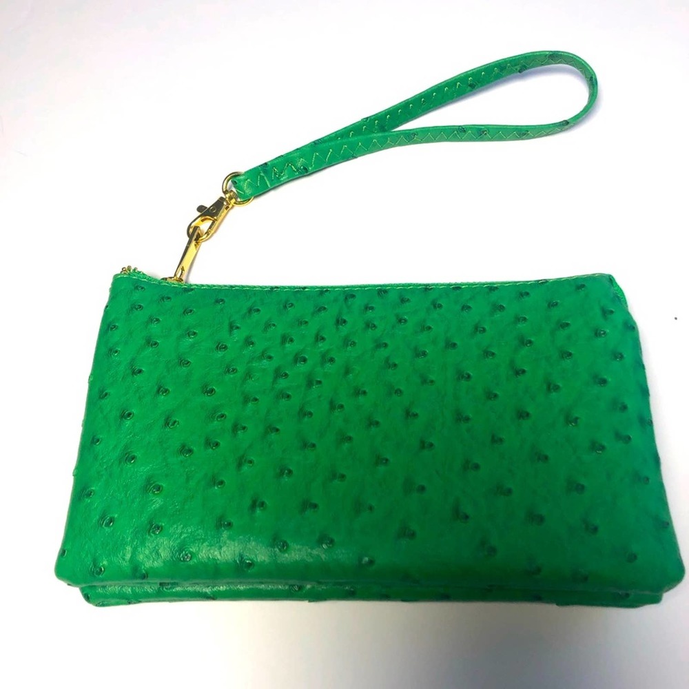 WRISTLET /CLUTCH /SMALL WALLET PURSE TONS OF POCKETS/STORAGE FOR A SMALL BAG